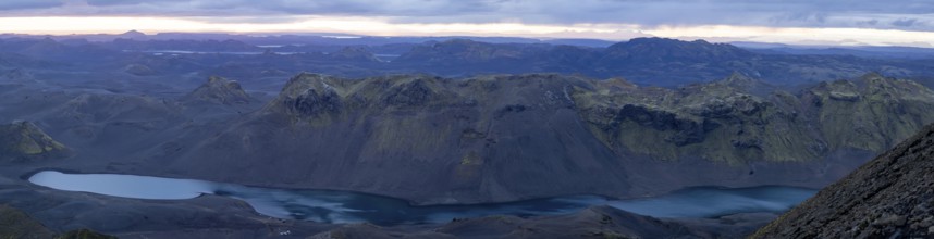 Cloudy mood and evening light, view from Mount Sveinstindur, volcanic landscape, Lake Langisjór,