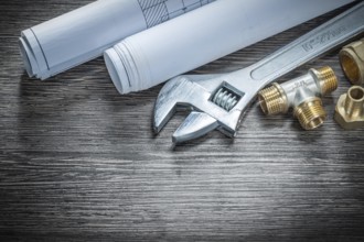 Adjustable wrench plumbing pipe connectors rolled construction drawings