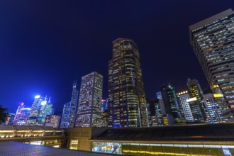 Aerial view of Hong Kong skyscrapers in Central District at night in Hong Kong island
