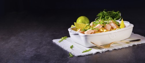 Salmon with penne noodle and arugula