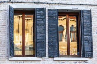 Reflection in a window, Venice, Italy
