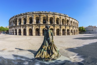 The Roman amphitheater in Nymes, Provence. The monument to toreador is placed into square. The