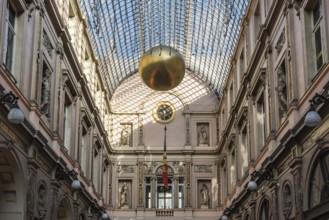 Brussels, Belgium, 12 18 2018: Glass roof and facades of the Saint Hubertus Gallery in Art Nouveau