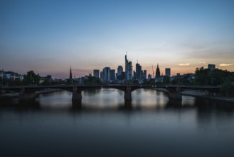 Frankfurt am Main, Hesse, Germany, 07 23 2018: cityscape at night taken from the river Main at the