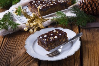 Christmas poppy seed cake with chocolate, nuts and sultanas