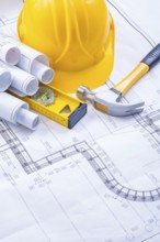Claw hammer rolled blueprints construction level helmet