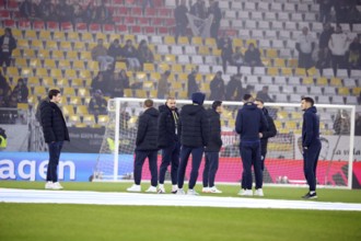 Bosnian players and staff inspecting the pitch in front of the UEFA Nations League match: Germany v