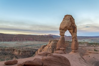 Sunrise over Delicate Arch in the Arches National Park, USA