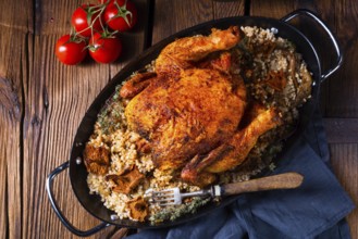 Grilled spicy chicken with pearl barley and mushrooms