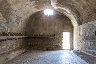HERCULANEUM, ITALY, MAY 05, 2022, Ancient ladys themral baths in the Roman city of Herculaneum
