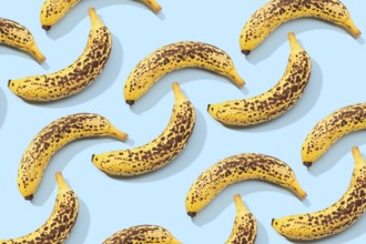 Spotted Banana pattern on blue background. Art food