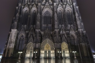 Gothic west facade of Cologne Cathedral at Night. Gothic west facade of Cologne Cathedral at Night,