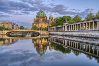 The Berlin Cathedral at dusk with a reflection in the River Spree