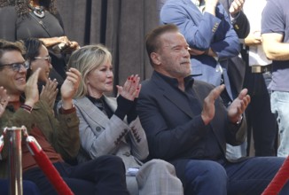Melanie Griffith, Jason Blum, and Arnold Schwarzenegger at Jamie Lee Curtis hand and footprint in