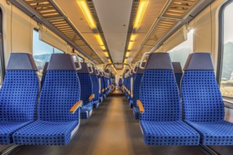 Image with the interior of a german border train. A modern train with comfortable and colorful