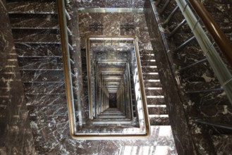 Brussels Capital Region, Belgium, 03 19 2022, Swirling staircase, view from above at the Royal