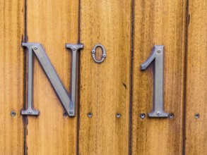 The designation number one on a wagon of a train. Symbolic photo for First and Best. Austria