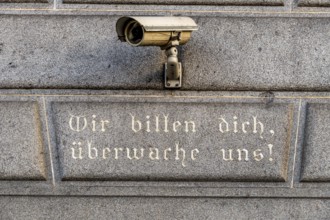 Surveillance camera on a building, symbol for surveillance, internal security, control, data