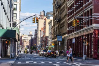 New York City, USA, June 25, 2018: Street with luxury fashion retail stores in Soho Cast Iron
