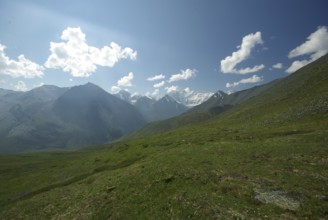 Mountain landscape. Highlands, the mountain peaks, gorges and valleys. The stones on the slopes