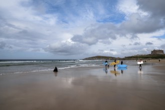 Newquay, United Kingdom, 4 Spetember, 2022:view of Fistral Beach in Newquay with surfers enjoying a