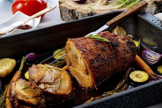 Lecere roll roast with vegetables and herbs