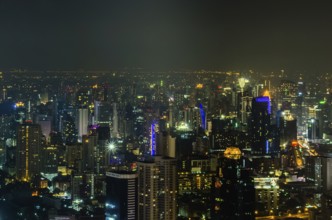 BAGKOK, THAILAND, NOVEMBER 21: Bangkok top night view on the business disctrict from Baiyoke Sky