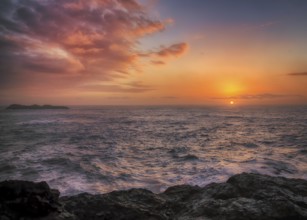 A dramatic sunset seascape at a northern California beach. USA