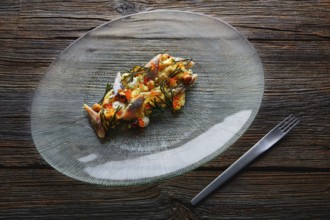 Smoked sardines salad with creamy cheese corn codium and hazelnuts
