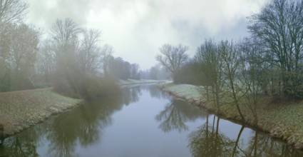 Fog and mist at dusk along the River Nidda in Frankfurt, Frankfurt am Main, Germany