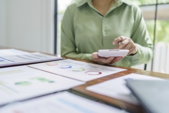 Business woman working in green eco friendly modern working space creative ideas for business eco