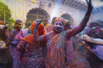 Widows celebrating Holi festival Gopinath temple, Uttar Pradesh, India, Asia