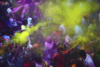 People throwing colored powder of Banke Bihari Temple, Uttar Pradesh, India, Asia