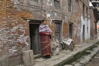 Woman stand home, bhaktapur, kathmandu, nepal, asia