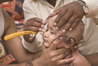 Tonsure baby boy receives hindu rite MR#714H