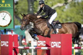 German rider Richard Vogel riding United Touch S competes in the second round and jumpoff of the