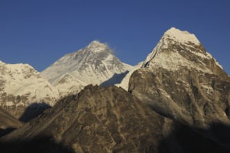 Mt Everest lit by golden evening light, Nepal