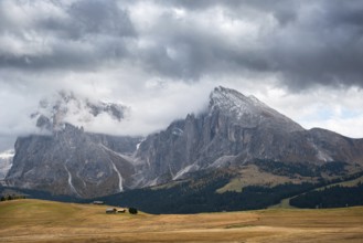 Landscape with beautiful autumn meadow field and the amazing Dolomite rocky peaks the valley of