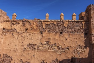 An old kasbah that served as a base for nomadic tribes, with a sense of ruggedness and adventure