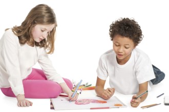 Interracial children drawing together, isolated on white