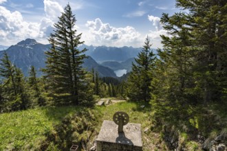 Hiking and climbing on the Tegelberg via the via ferrata at Neuschwanstein Castle in the Ammergau