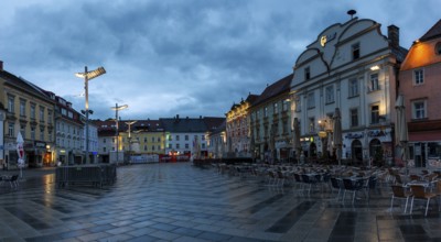 Evening mood, rain clouds over the main square, panoramic shot, Leoben, Styria, Austria