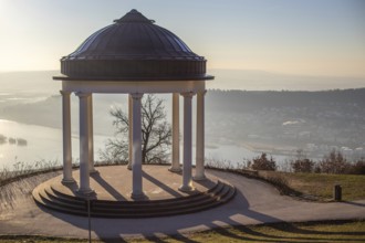 Beautiful temple in a landscape shot. Sunrise on a winter morning. Beautiful view along the Rhine