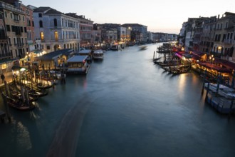 Evening atmosphere, view from the Rialto Bridge onto the Grand Canal, long exposure, Venice, Italy