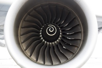 Airbus A380 airplane's engine closeup on a runway at an airport