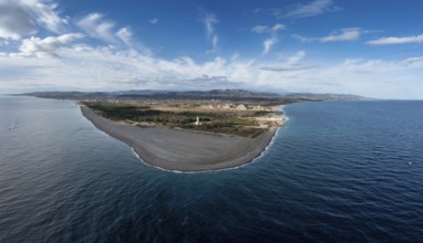 A panorama drone landscape view of Punta Alice beach and lighthouse in Calabria
