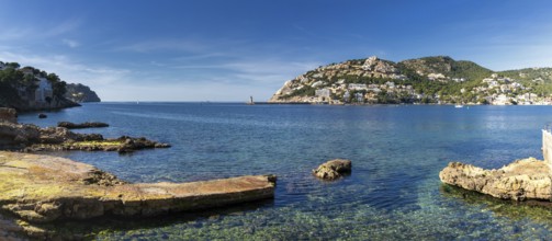 A panorama landscape view of the idyllic natural port and harbour town of Andratx in eastern
