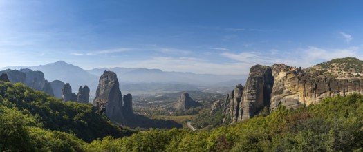 Panorama landscape view of the Meteora rock formations with the Saint Nikolaos monastery