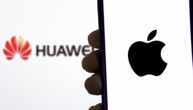Apple Vs Huawei logo on a smartphone