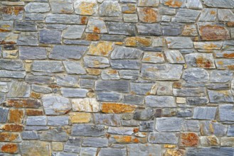 Slate stone masonry stone wall in Andorra Pyrenees